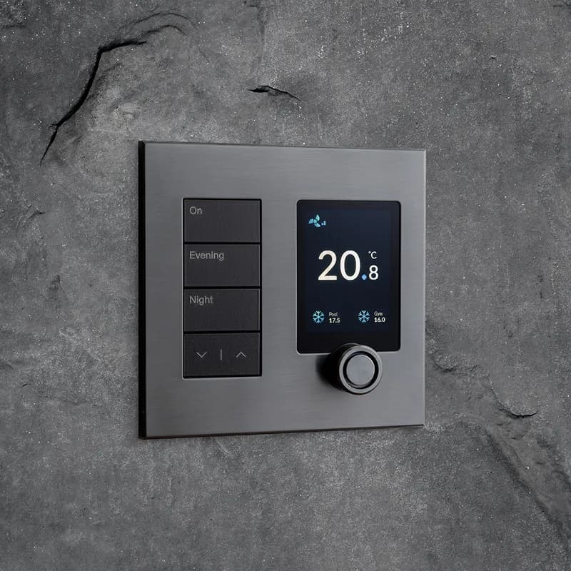 Scene keypad and climate display combined, lighting moods alongside live pool and gym temperatures, in a single brushed panel.